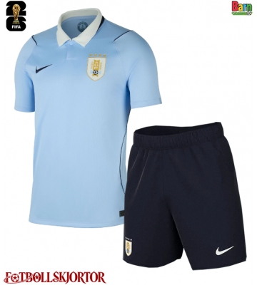 Uruguay Hemmakläder Barn VM 2026 Kortärmad (+ Korta byxor)